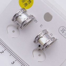 Серьги сталь№678 клипсы широкие полукольца с центральной вставкой и цирконами купить бижутерию в магазине бижутерия-оптом.