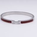 Браслет сталь№745 жесткий брендовый браслет Hermes с бордовым акцентом купить качественные украшения.