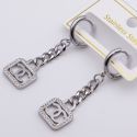 Серьги сталь№820 подвески стилизованная сумочка Chanel с панцирной цепью куплю бижутерию сталь оптом.