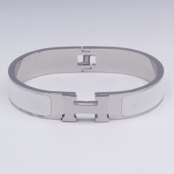 Браслет сталь№848 жесткий брендовый браслет Hermes с белой эмалью купить качественные украшения.