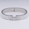 Браслет сталь№848 жесткий брендовый браслет Hermes с белой эмалью купить качественные украшения.