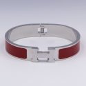 Браслет сталь№849 жесткий брендовый браслет Hermes с бордовой эмалью купить качественные украшения.