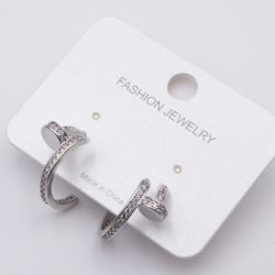 Серьги сталь№860 изогнутый гвоздь Cartier с белой дорожкой купить качественные украшения.