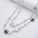 Подвеска№2574 длинная в стиле Chanel с жемчужинами разного диаметра и логотипами купить недорого в интернет-магазине.